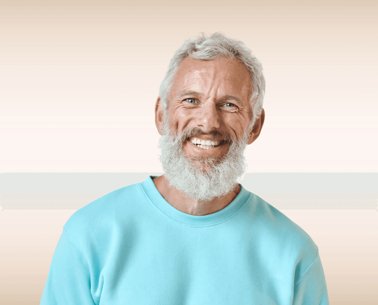 Smiling man with gray beard after TMJ treatment